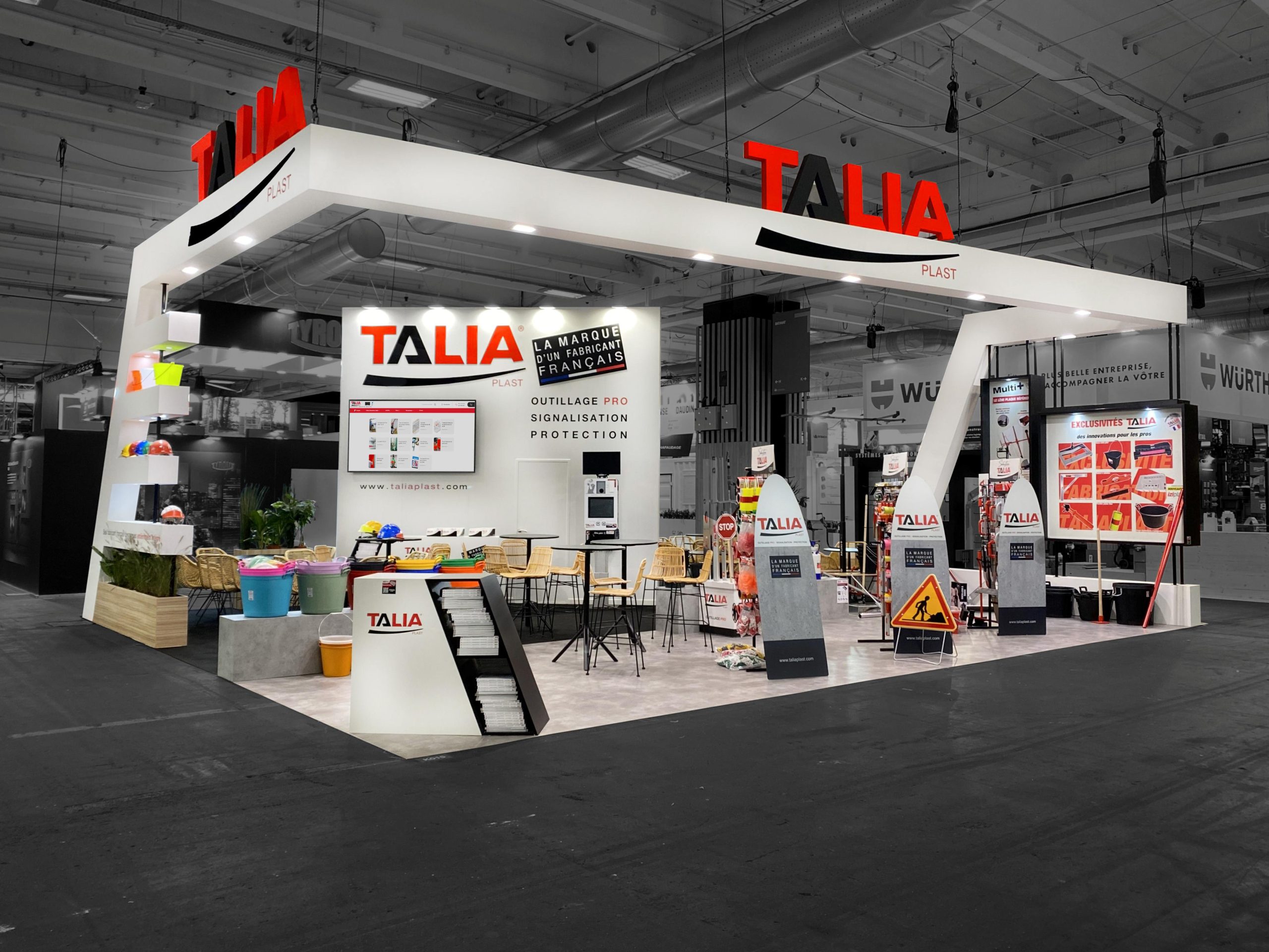 stand traditionnel réalisé par audace pour taliaplast sur batimat 2024. Illustration pour un article sur batimat 2026.